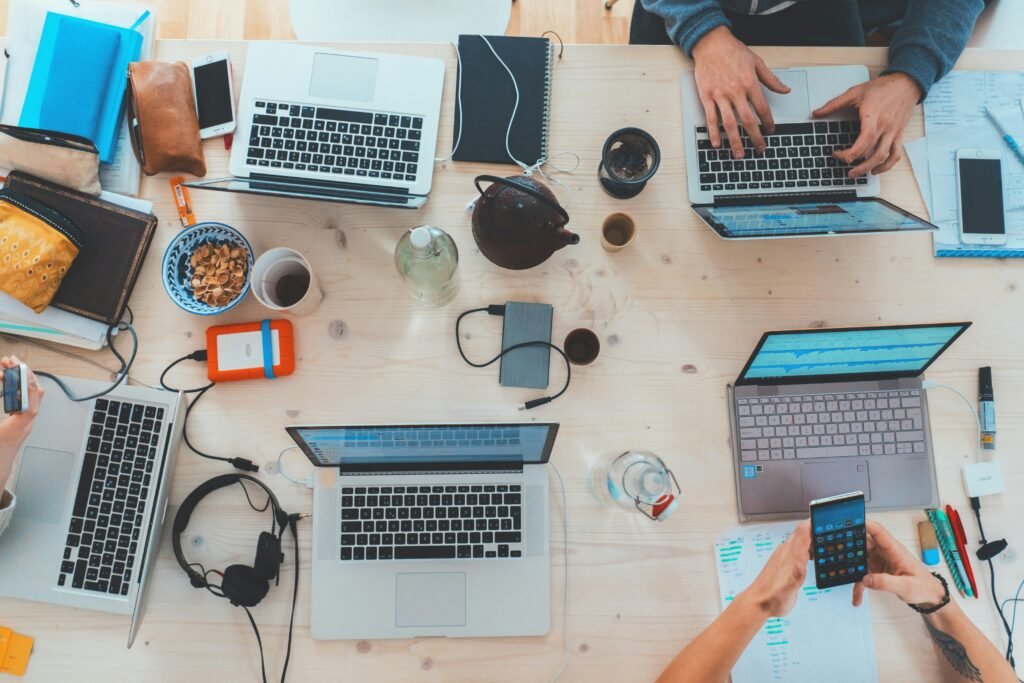 A group of people doing digital works